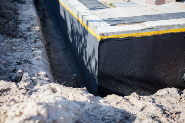 Professional Waterproofing technician working in Oakfield, WI